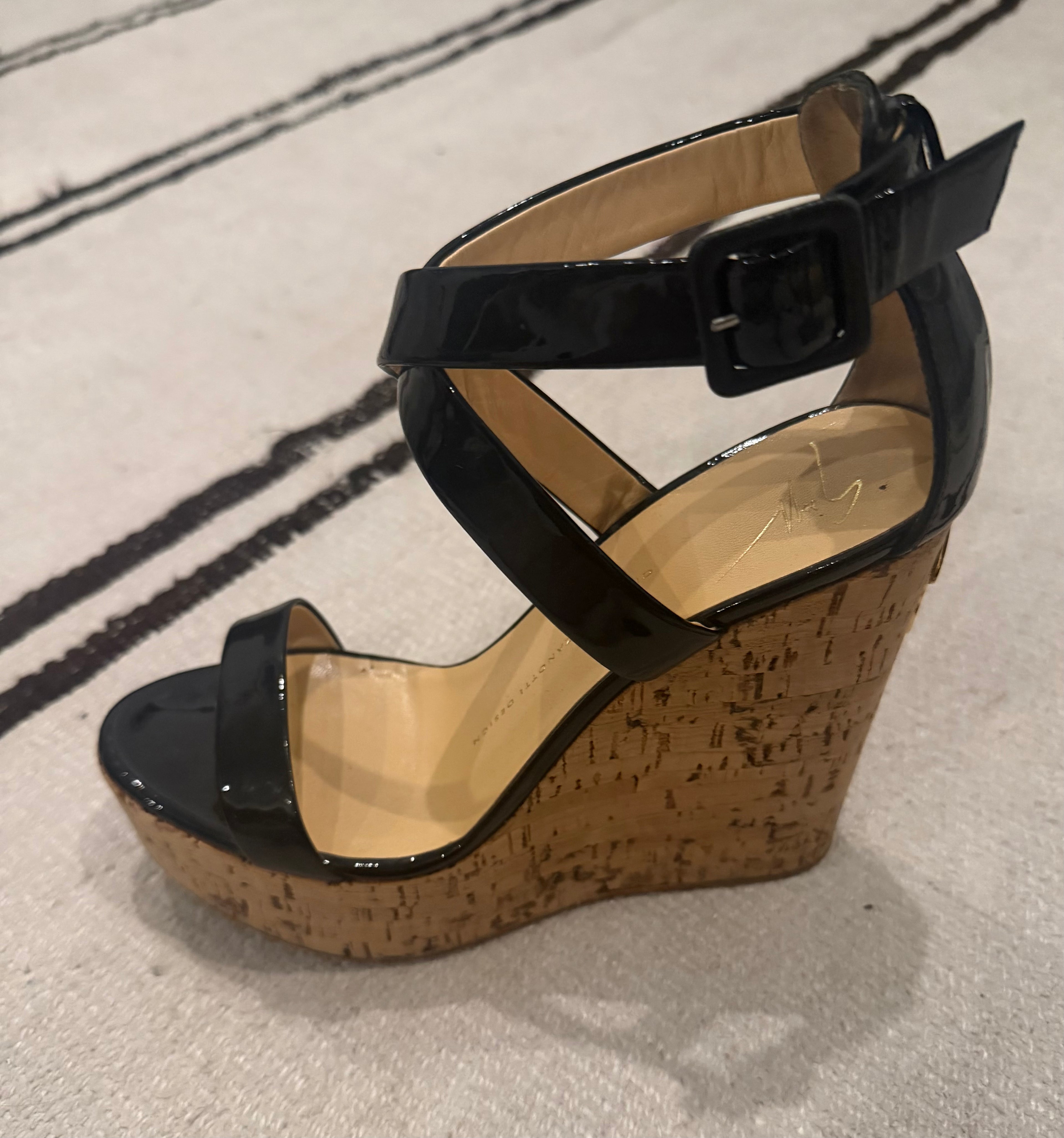 Giuseppe Zanotti Patent Leather Cork Wedges. Timeless Italian luxury wedges crafted in glossy black patent leather with a cork platform heel - 38