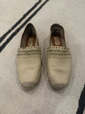 Valentino Garavani Rockstud Espadrille Mules in off-white/ivory pebbled leather with the signature platinum-tone Rockstud detailing - 38