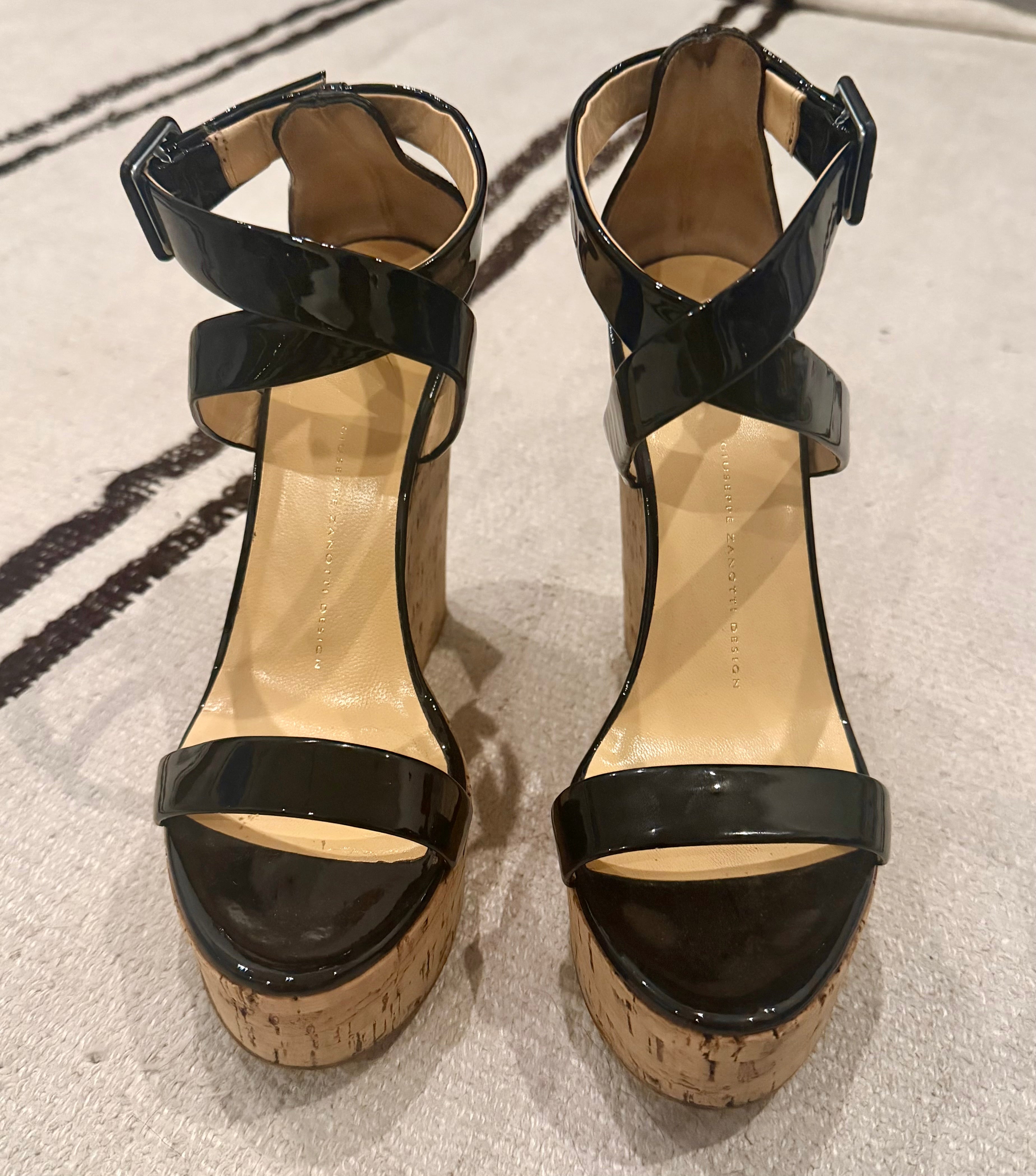 Giuseppe Zanotti Patent Leather Cork Wedges. Timeless Italian luxury wedges crafted in glossy black patent leather with a cork platform heel - 38